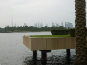 Teeing off from a concrete slab over water with Burg Kalaifa, the tallest building in the world over my shoulder also makes it difficult to focus. 