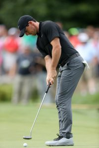 Rory made a slight tweak by holding the grip with both hand parallel.